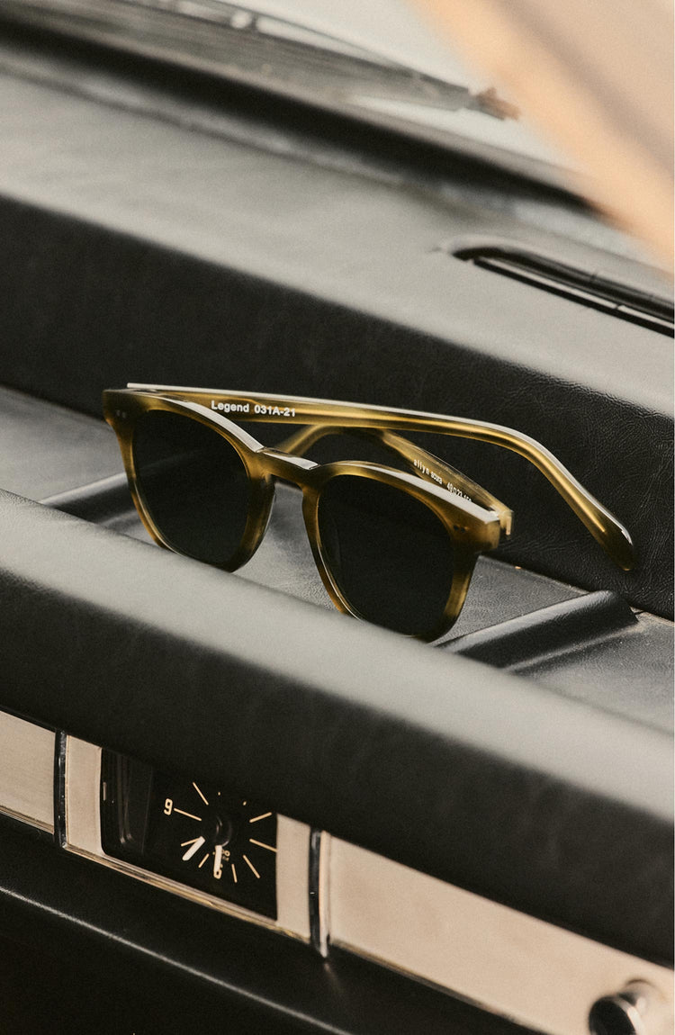 fit model posing in The Legend in Green Tortoise