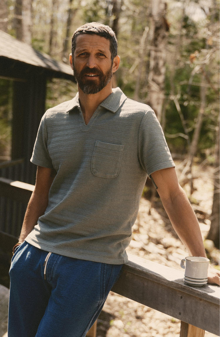 fit model posing in The Meridian Polo in Faded Pine