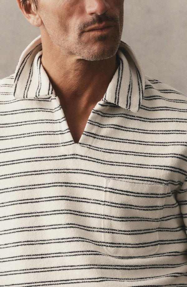 fit model showing off the collar on The Meridian Polo in Marine Stripe