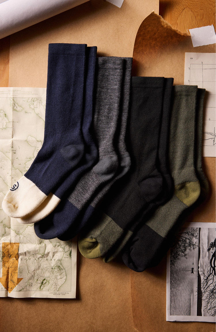 flatlay of various socks for The Merino Sock in Charcoal