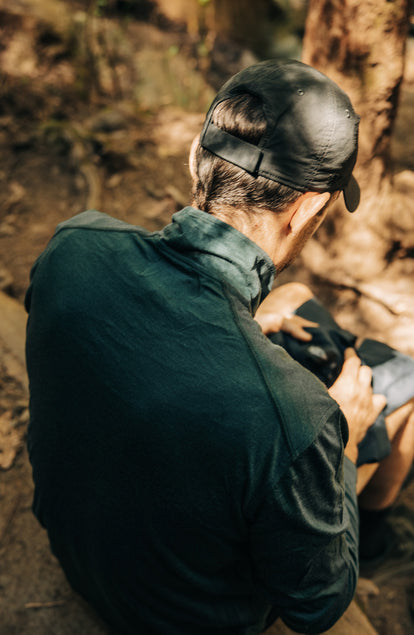 fit model showing the back of The Merino Half Zip in Forest