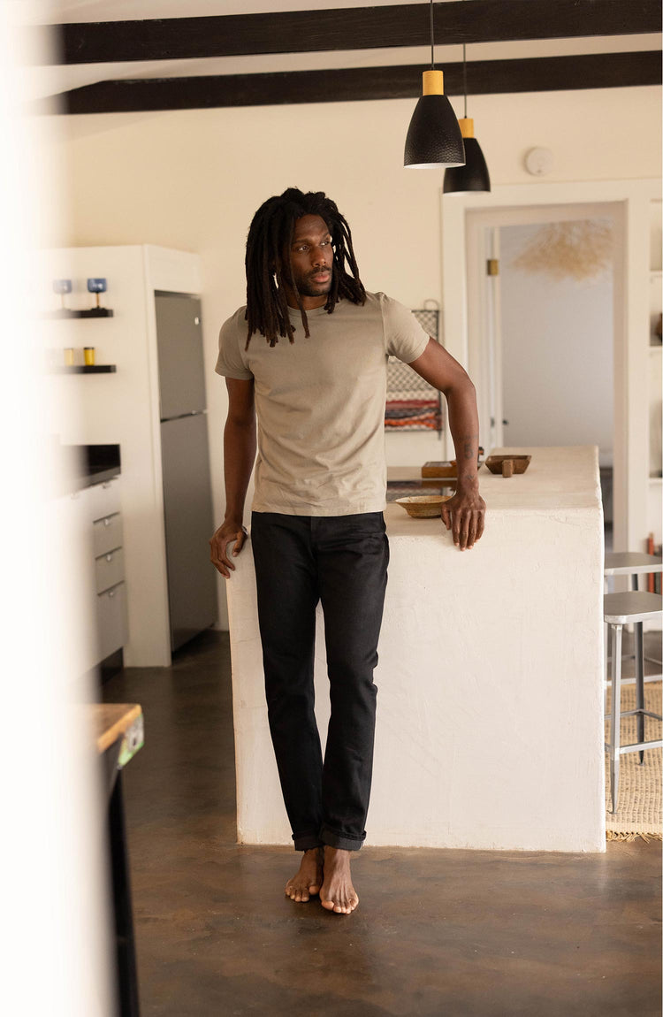 fit model posing in The Organic Cotton Tee in Sage