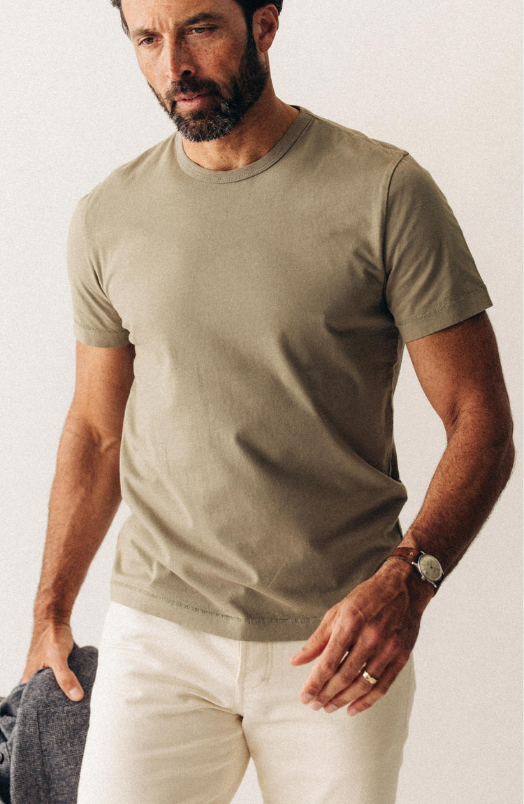 fit model posing in The Organic Cotton Tee in Sage