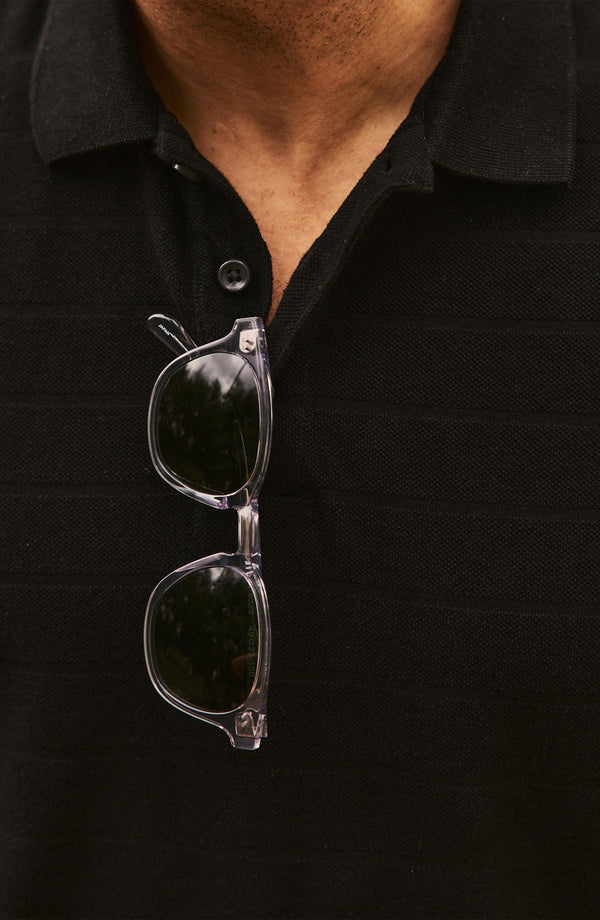 material shot of the collar on The Pacific Polo in Black Indigo Pique Stripe