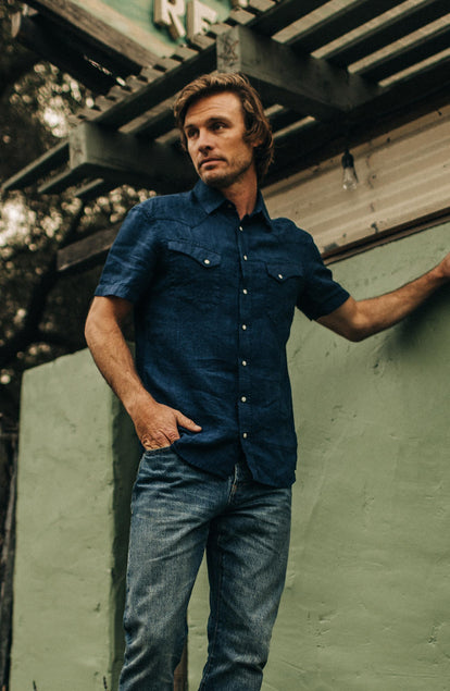 fit model standing in the short sleeve western in indigo linen