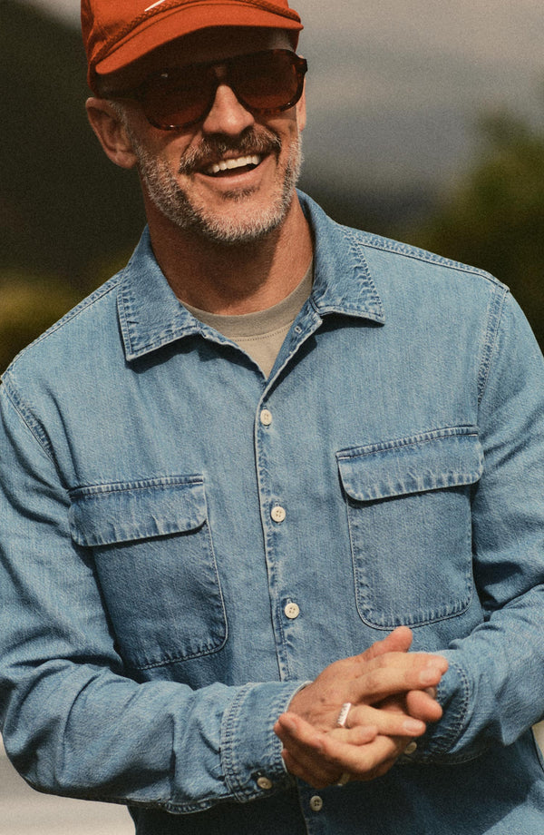 fit model showing off The Shore Shirt in Washed Indigo Twill