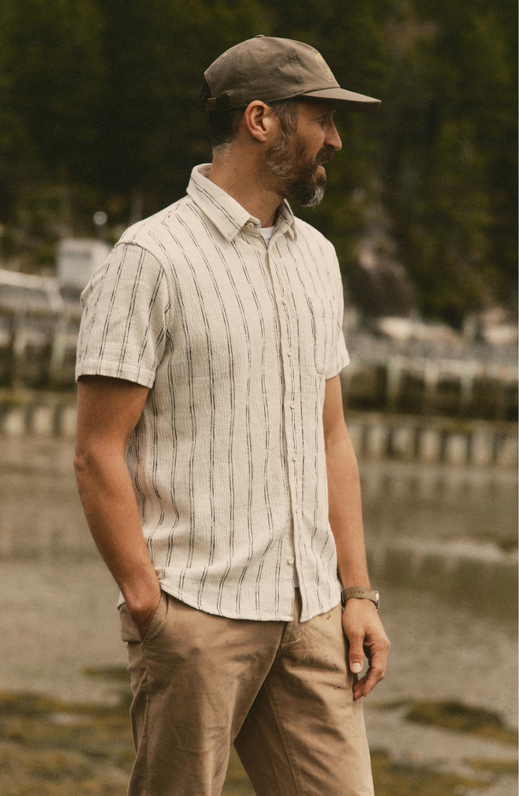 fit model posing in The Short Sleeve California in Tide Stripe Hacci