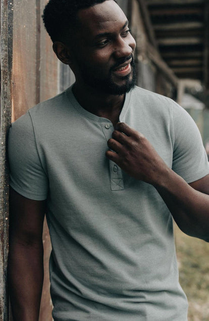 Our model in the short sleeve heavy bag henley in slate