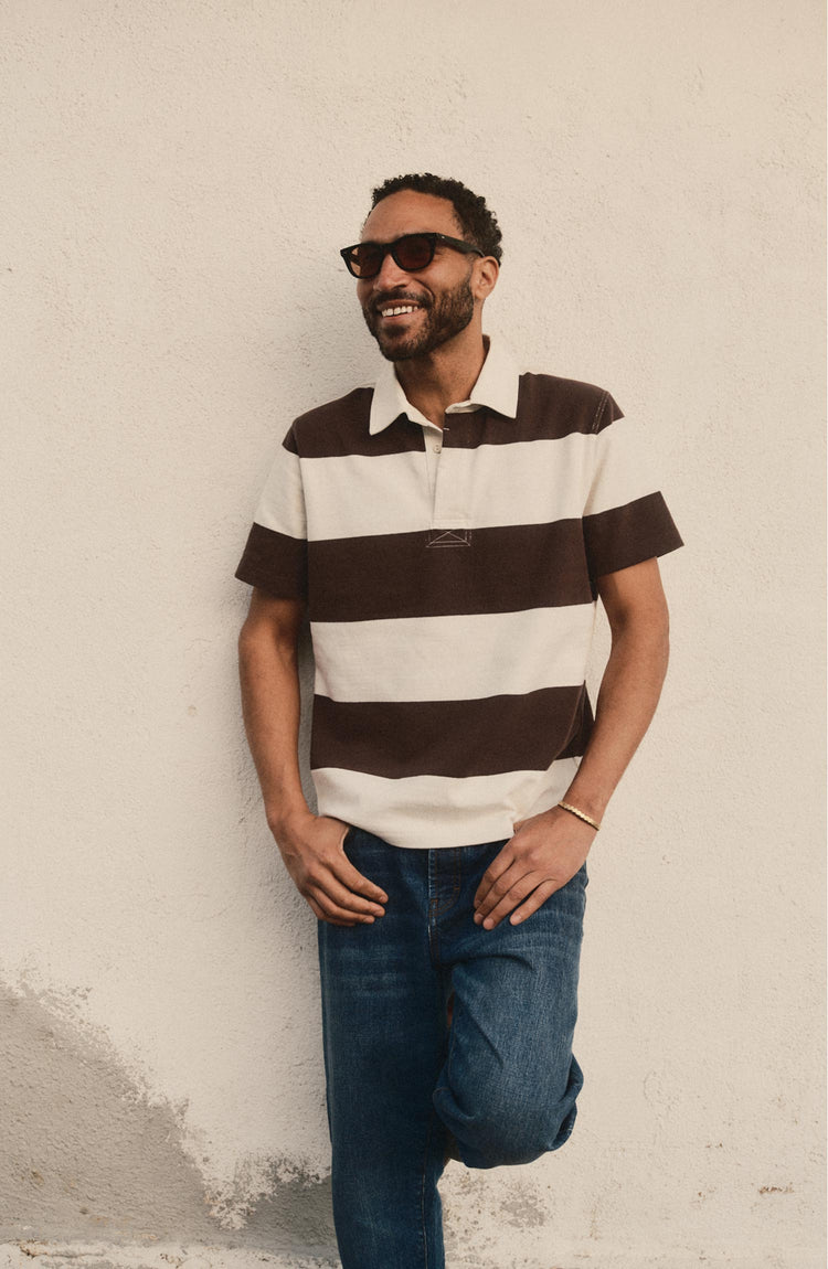 fit model posing in The Short Sleeve Rugby Shirt in Port Stripe