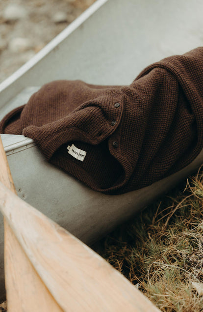 fit model walking wearing The Sidecountry Sweater in Coffee Heather Merino Waffle