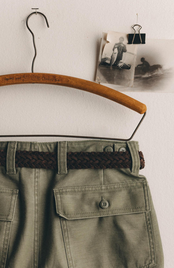 editorial image of The Surplus Short in Field Olive Reverse Sateen hanging