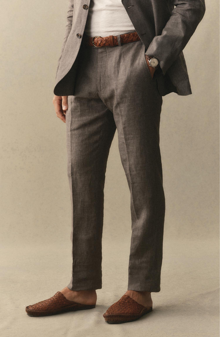 fit model posing in The Stevens Trouser in Morel Micro Check