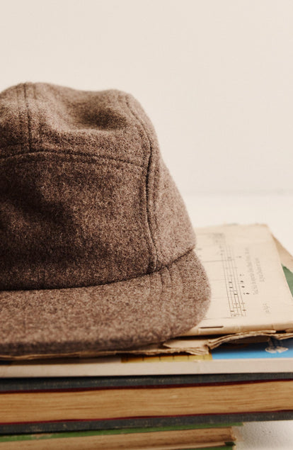 editorial image of the front of The 5-Panel Cap in Heather Sable Wool Blend