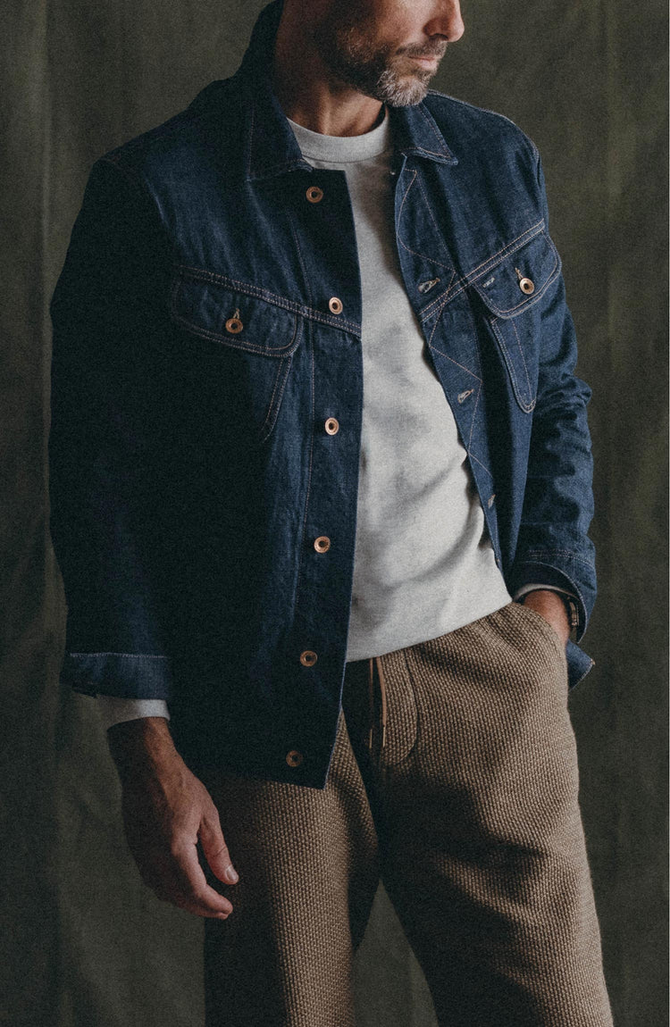 fit model with his hand in his pocket wearing The Apres Pant in Cypress Sashiko