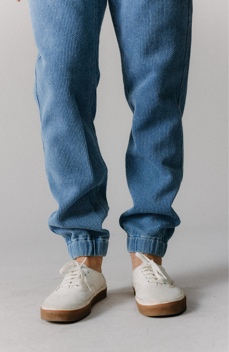 editorial flatlay of The Apres Pant in Washed Indigo Sashiko