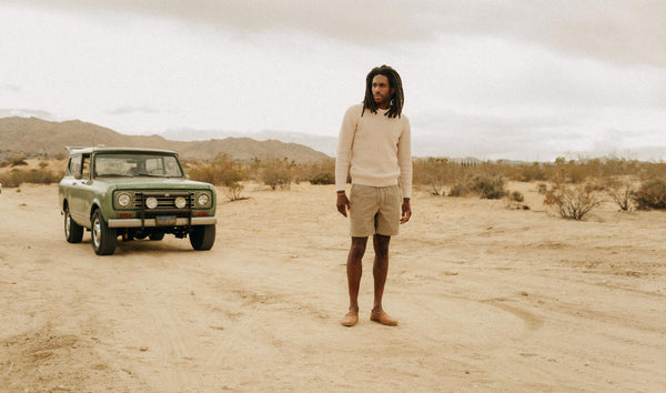 fit model wearing The Apres Short in Heather Moss with a sweater