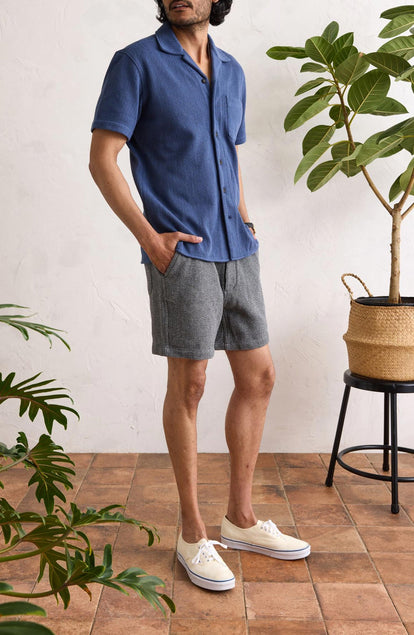 Our model standing in The Apres Short in Charcoal Waffle