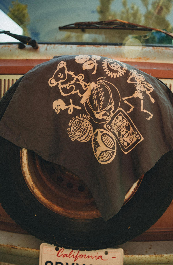 editorial image of The Bandana in Faded Black Stamp hanging on a car door