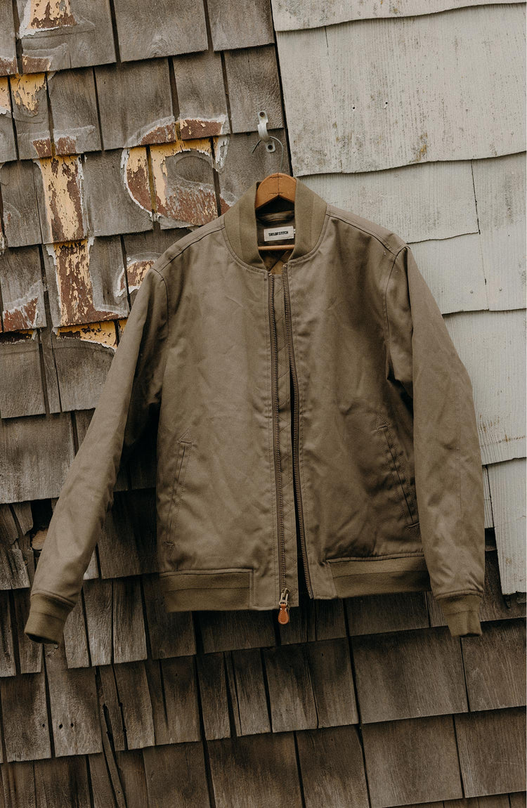 fit model wearing The Bomber Jacket in Fatigue Olive Dry Wax