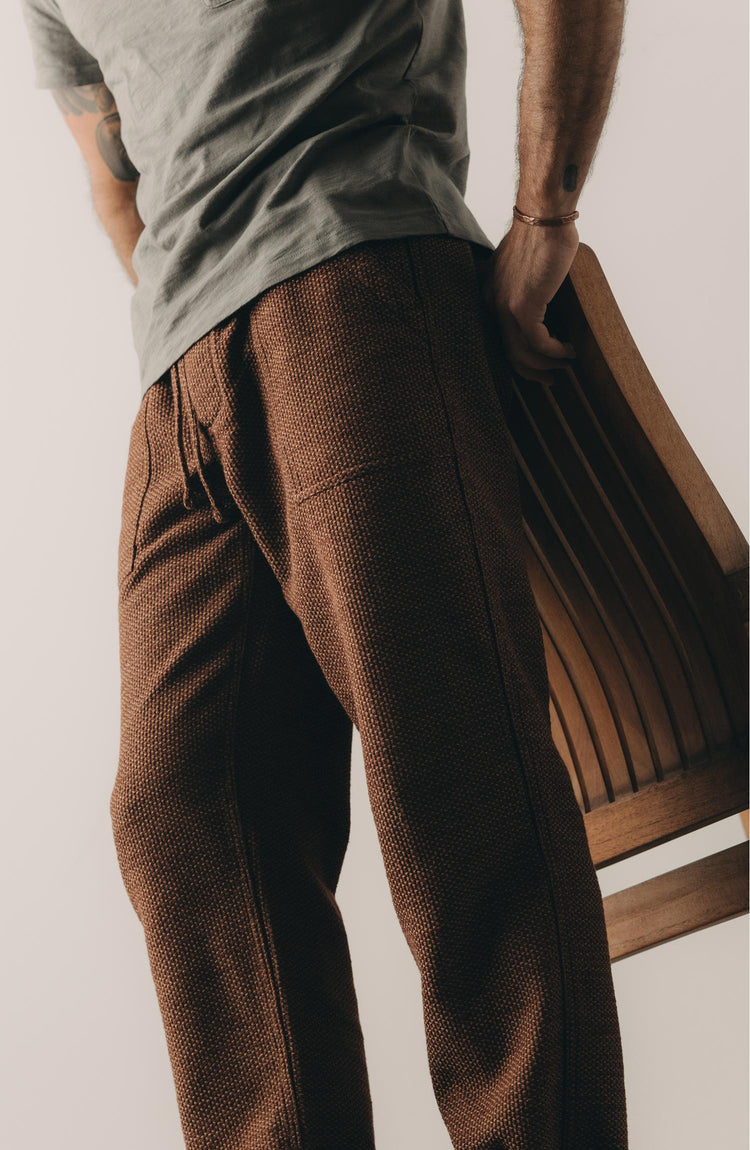 fit model walking wearing The Breakwater Pant in Black Cherry Sashiko