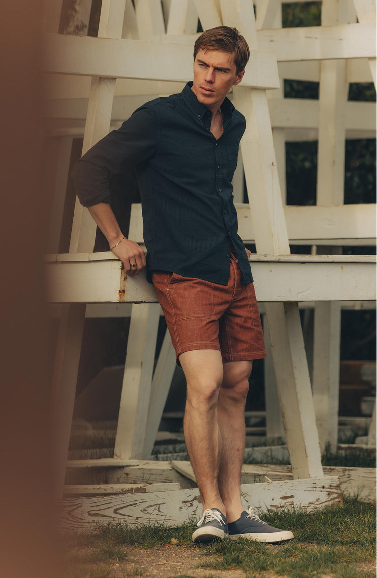 fit model posing in The Breakwater Short in Brick Chambray