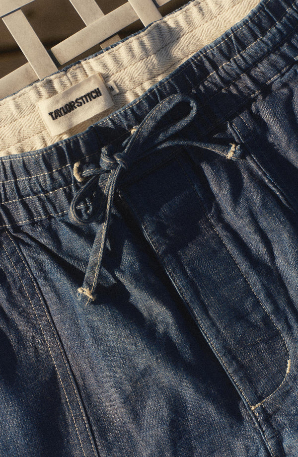 fit model posing in The Breakwater Short in Washed Indigo Chambray