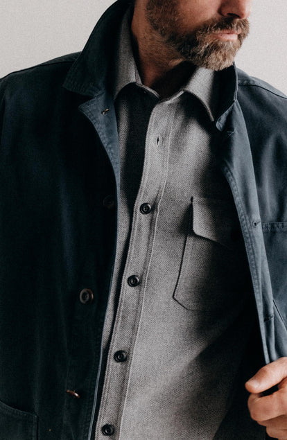 fit model showing off the buttons on The CPO Shirt in Heather Ash Twill