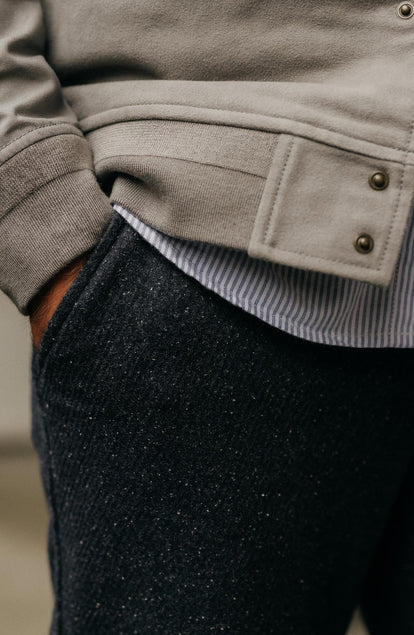 fit model with his hand in the pocket of The Carnegie Pant in Navy Nep Wool