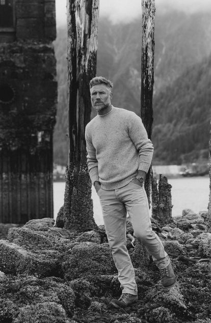 fit model walking on rocks wearing The Chore Pant in Stone Chipped Canvas