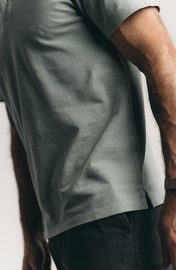 fit model showing off The Cotton Hemp Polo in Surf Green Pique