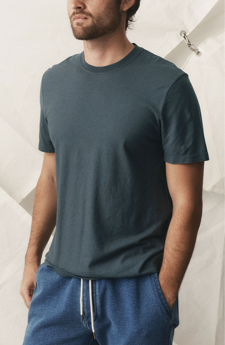 fit model posing in The Cotton Hemp Tee in Navy