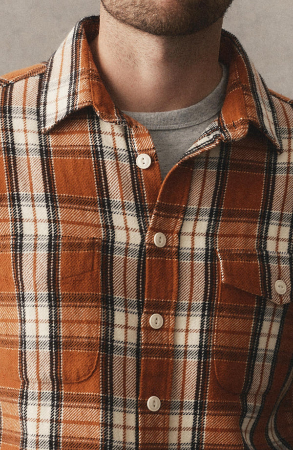 editorial image of The Crater Shirt in Brick Plaid hanging