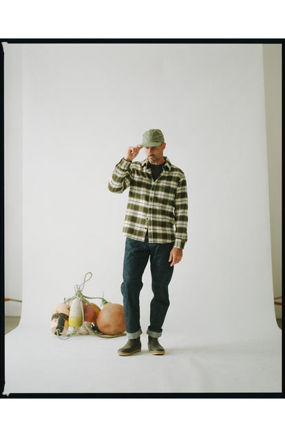 fit model showing off The Crater Shirt in Forest Plaid