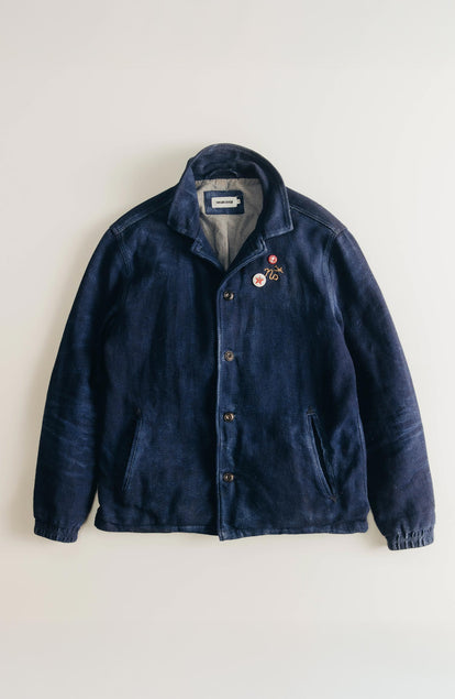 editorial image of The Crew Jacket in Raw Indigo Sashiko on a hanger
