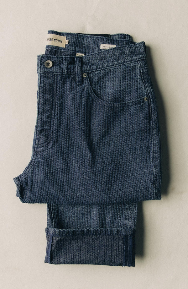 editorial flatlay of The Democratic Jean in Japanese Washed Indigo Sashiko