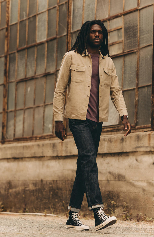 fit model showing off cuffs on The Democratic Jean in Rigid Organic Selvedge