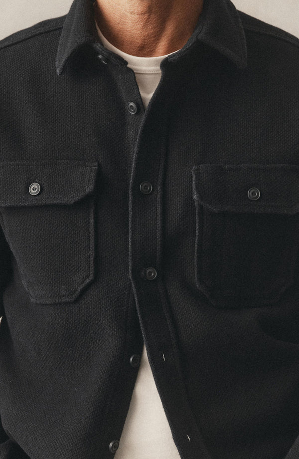 fit model showing the buttons on The Division Shirt in Black Indigo