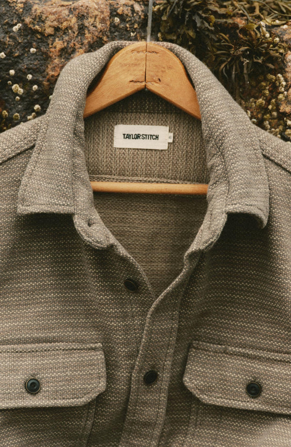 editorial image of The Division Shirt in Cypress hanging