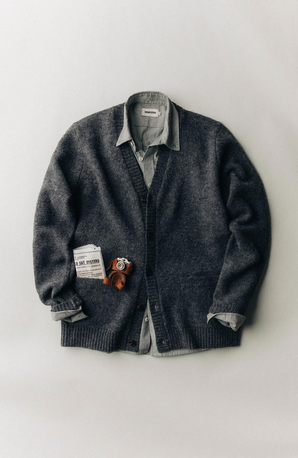 editorial flatlay of The Eastmoor Cardigan in Heather Graphite Wool