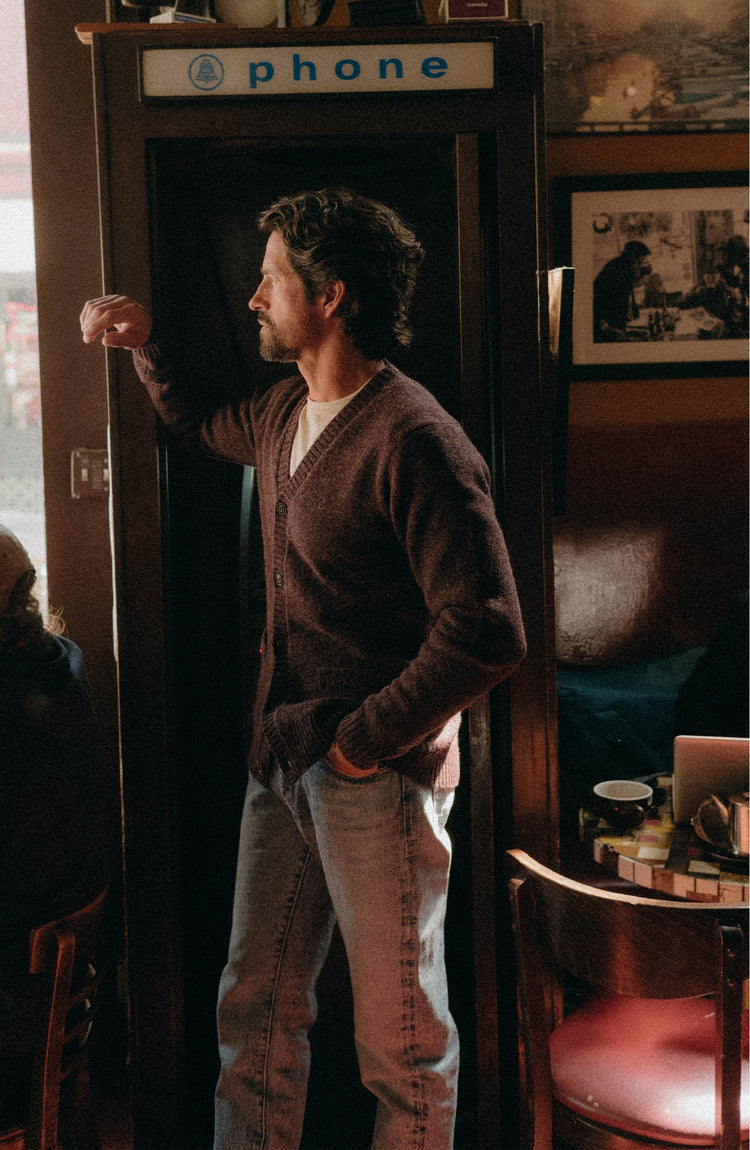 fit model posing in The Eastmoor Cardigan in Heather Port Wool