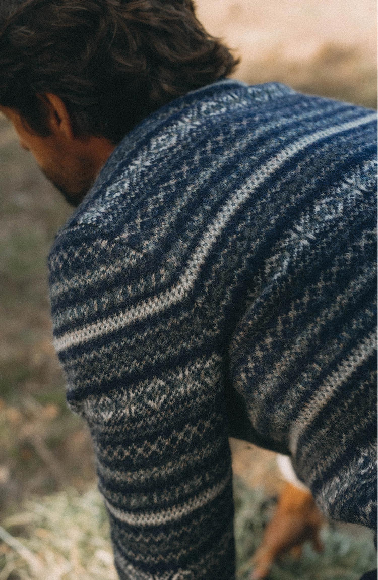 fit model posing n The Eastmoor Sweater in Navy Fair Isle Wool