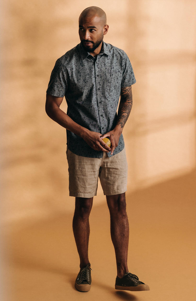 fit model standing wearing The Easy Short in Natural Linen