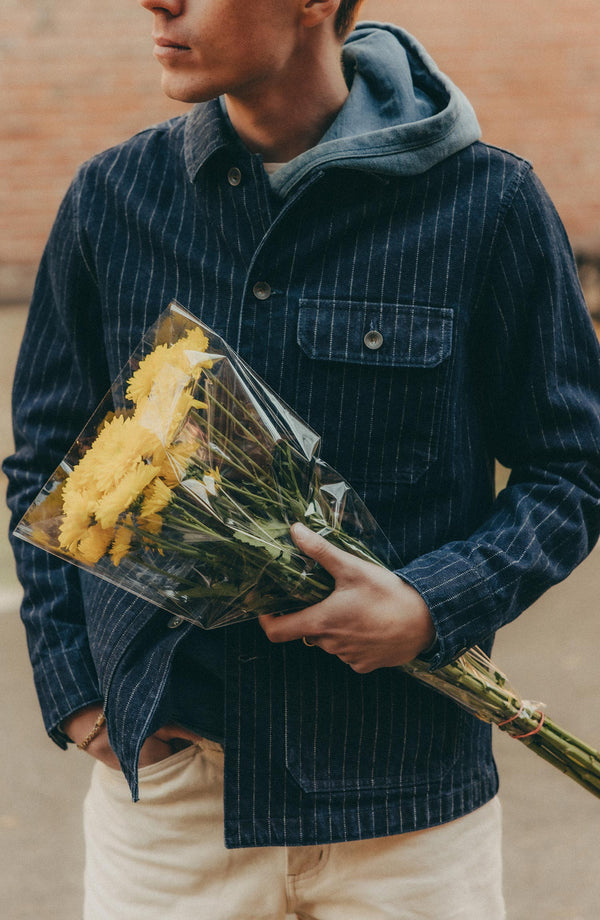 fit model showing off The Fremont Jacket in Rinsed Indigo Dobby Denim
