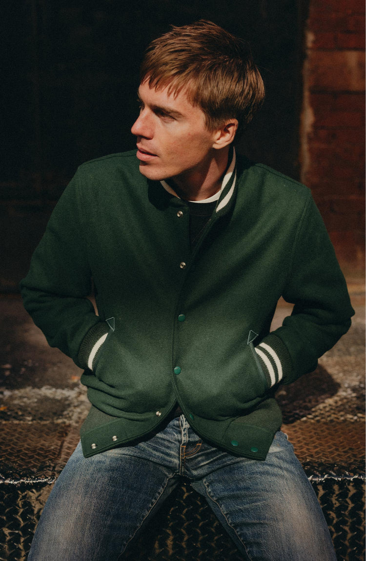 fit model posing in The Golden Bear Snap Bomber in Ivy Wool