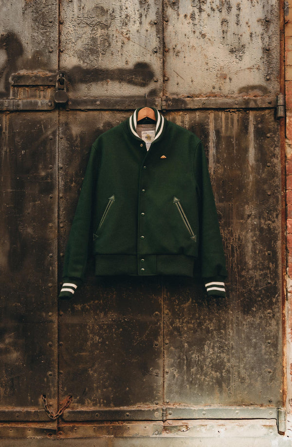 editorial image of The Golden Bear Snap Bomber in Ivy Wool hanging