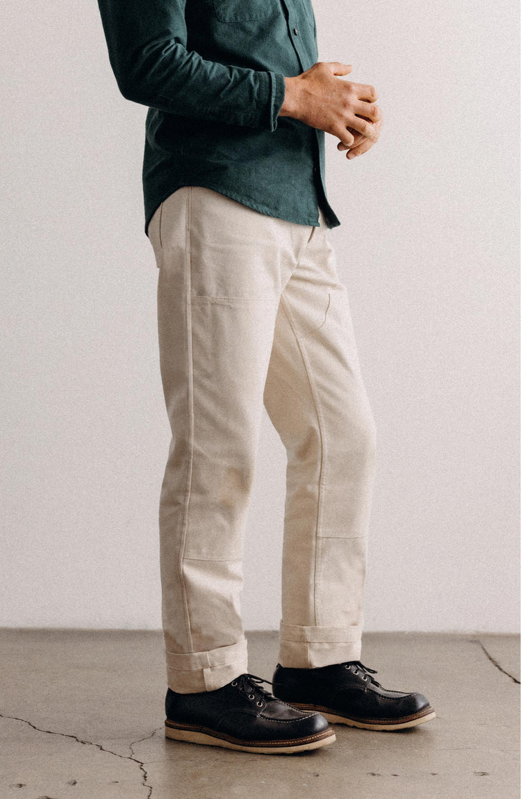 fit model posing in The Good Acre Chore Pant in Natural Canvas