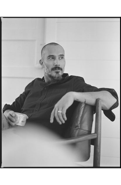 fit model sitting wearing The Jack in Dark Navy Seersucker