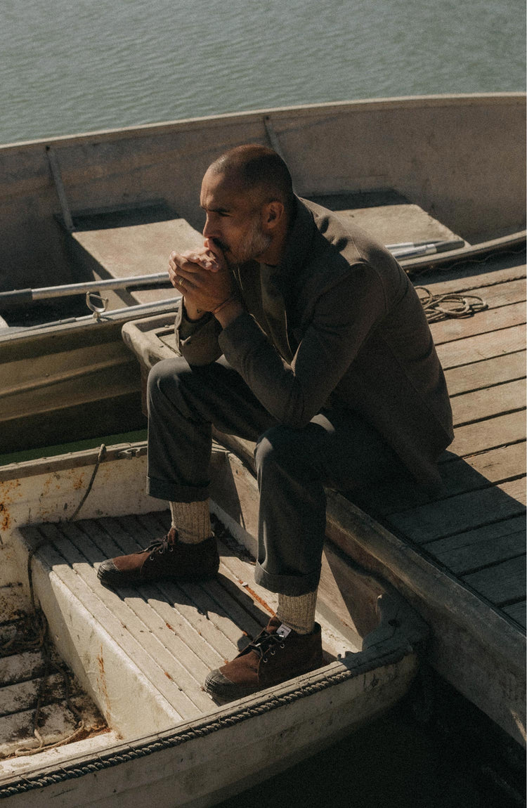 fit model sitting wearing The Jack in Fatigue Olive Waffle