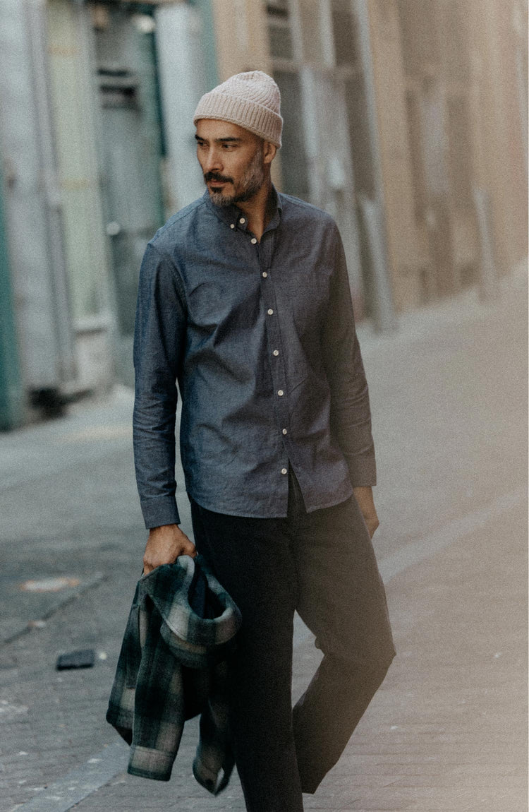 fit model with his hand in his pocket wearing The Jack in Rinsed Indigo Chambray