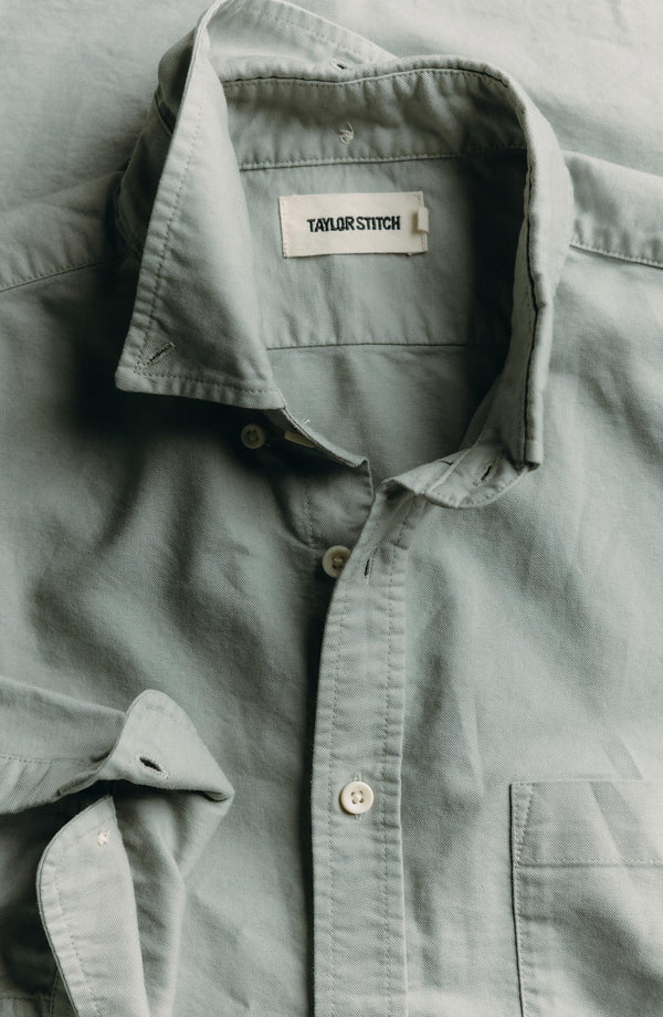 editorial flatlay of The Jack in Surf Green Oxford